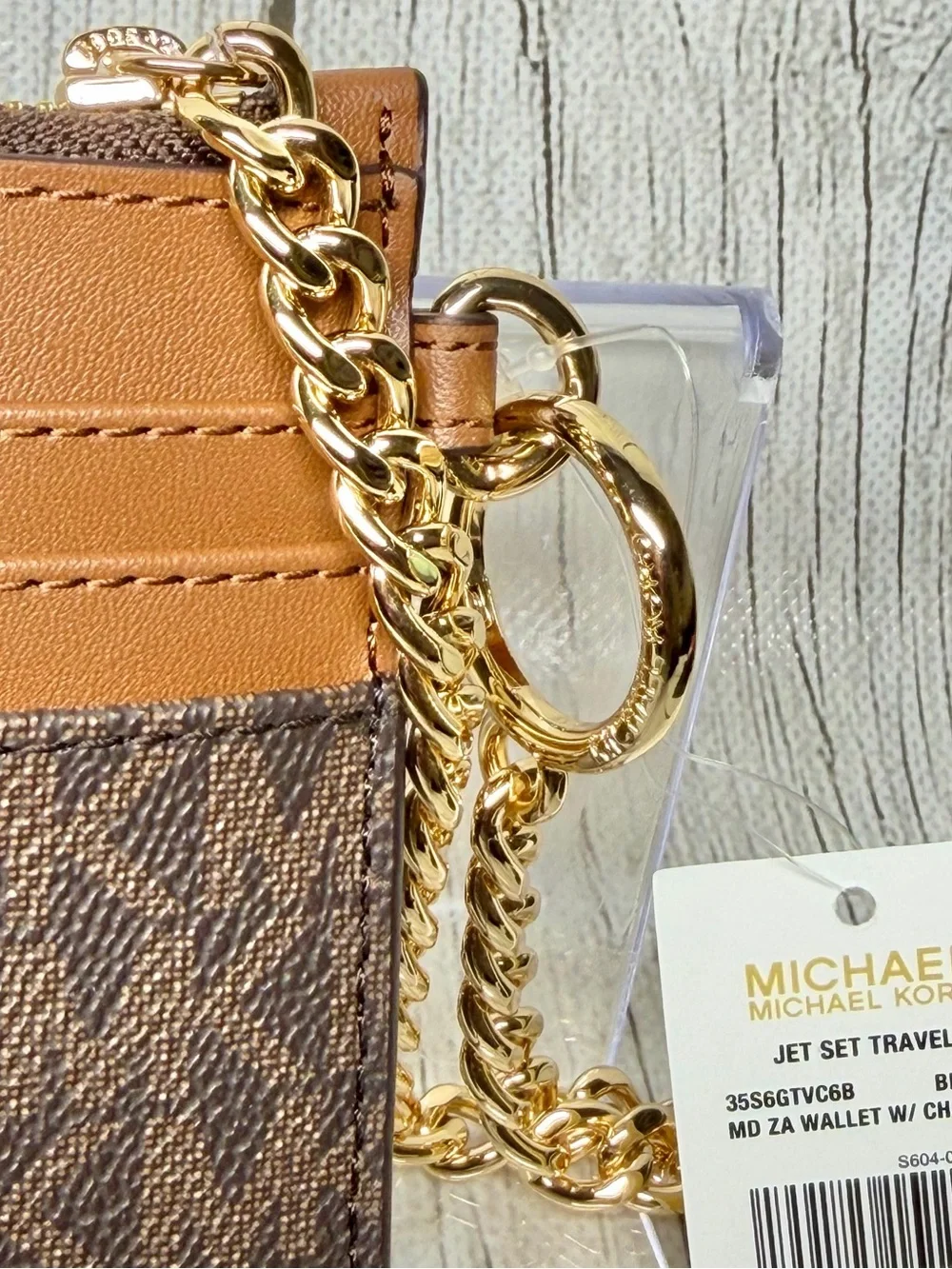 Michael Kors wallet logo